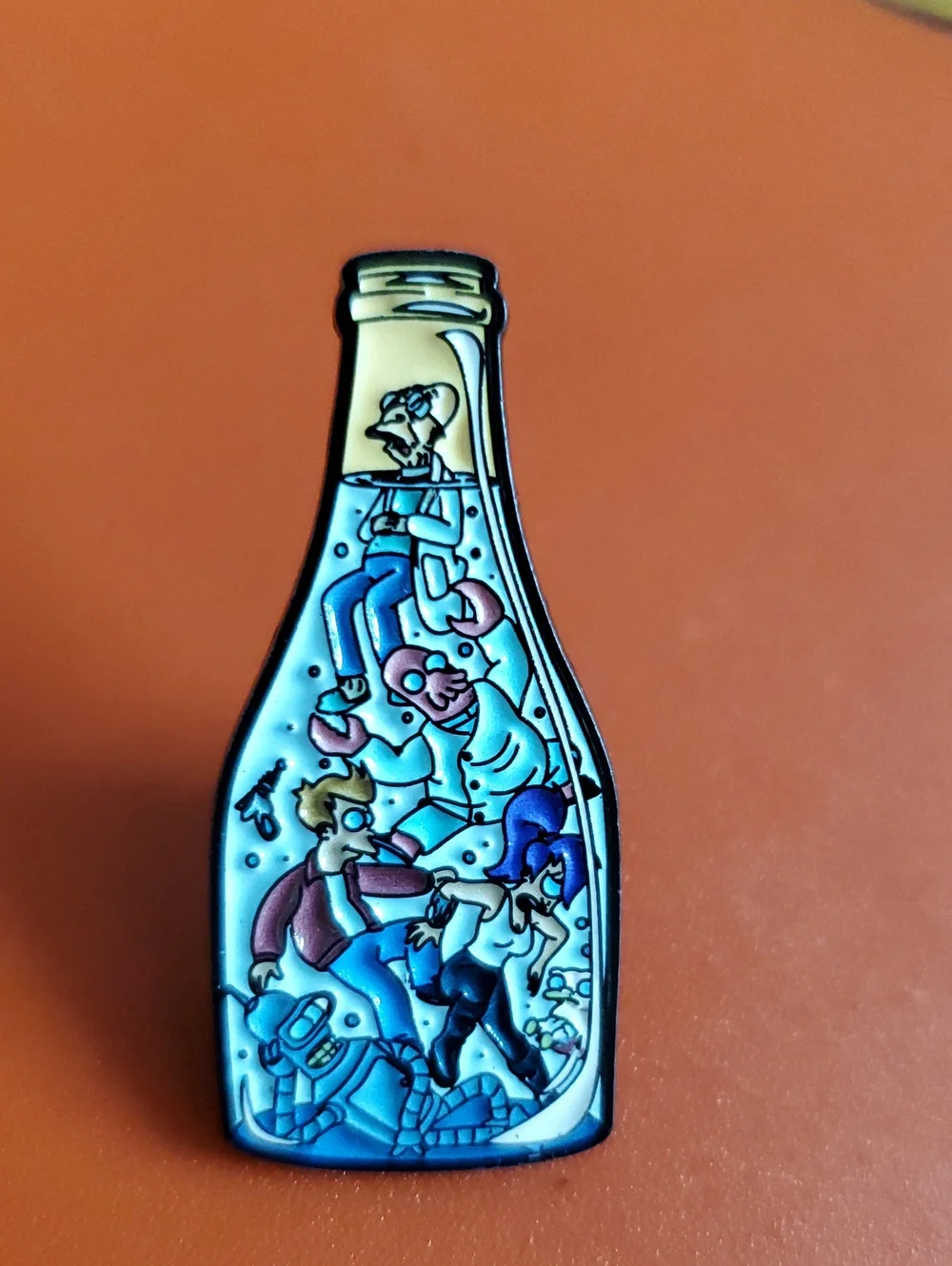 Futurama Enamel Cartoon Bottle Pin in Teal, Blue & Peach